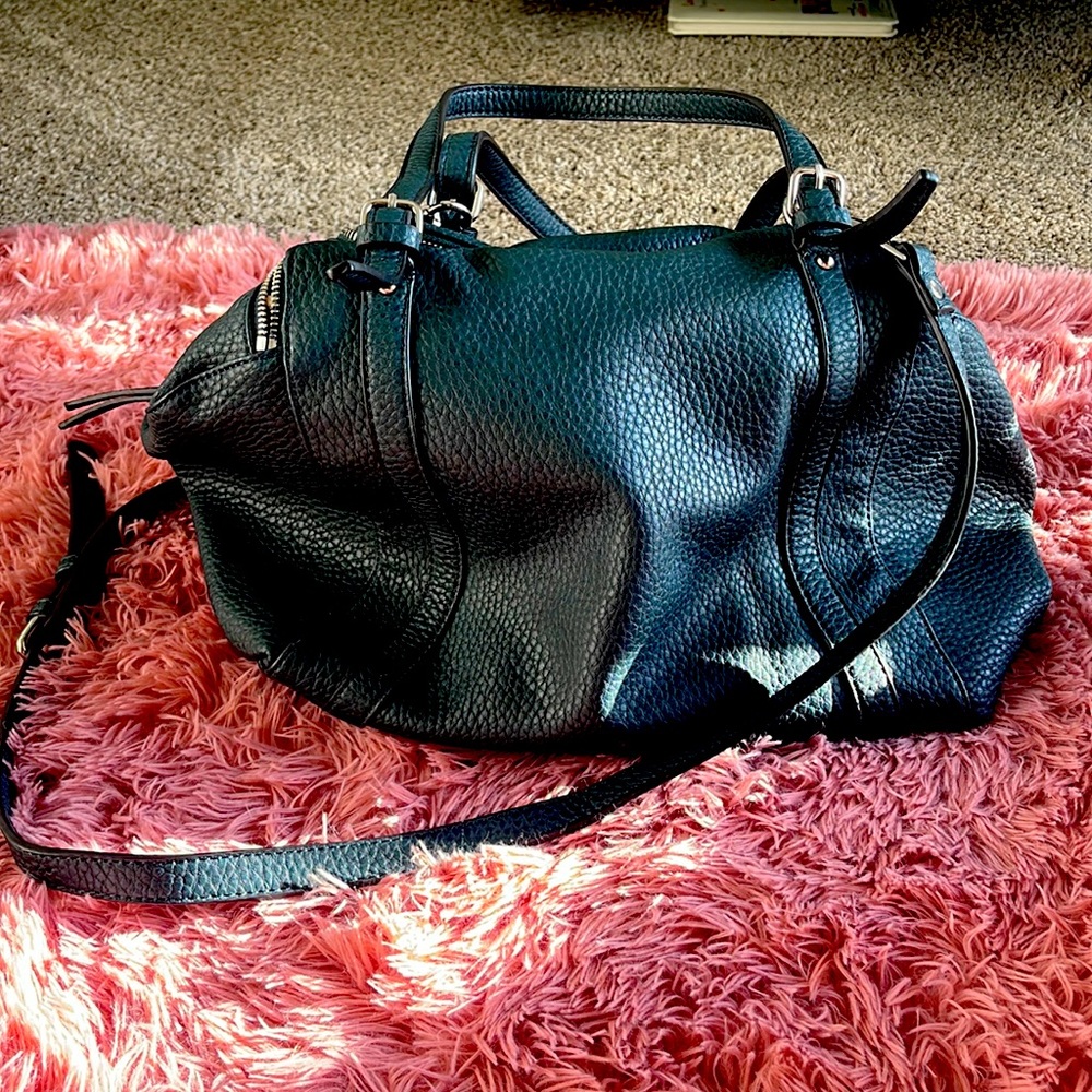 Navy large handbag. Urban expressions. Maybe used once or twice.